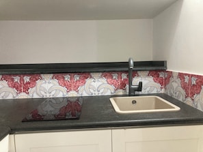 Apartamento, 1 quarto | Cozinha privada | Geladeira, cooktop, lava-louças, cafeteira/chaleira
