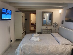 Apartment, 1 Bedroom | 1 bedroom, iron/ironing board, travel crib, free WiFi