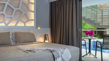 Minibar, coffres-forts dans les chambres, bureau, rideaux occultants