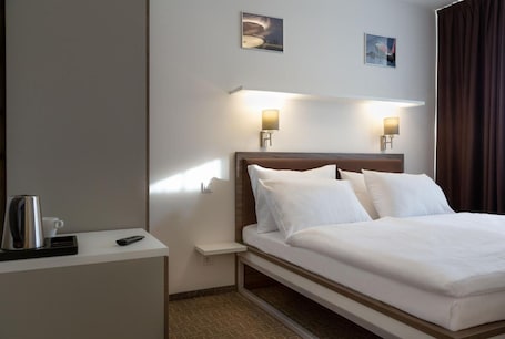 Premium bedding, in-room safe, soundproofing, iron/ironing board