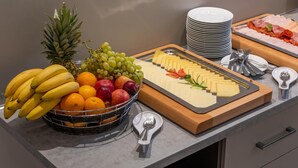 A buffet table with fruits, cheese, and meats. - SKY Hotel Prague (Prague)