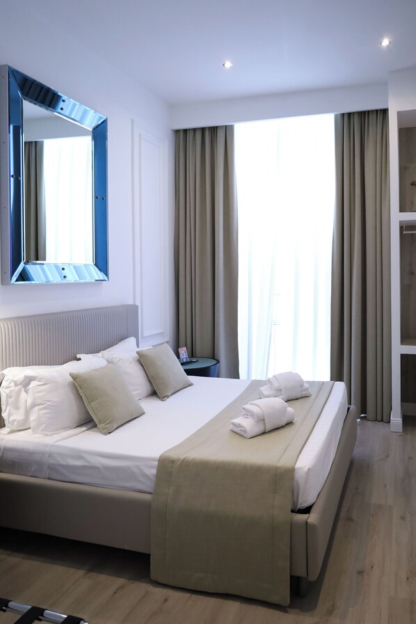 Coffres-forts dans les chambres, fer et planche à repasser