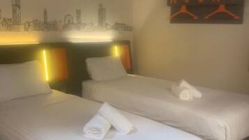 Lower Ground Twin Room with Window | Iron/ironing board, free WiFi, bed sheets, wheelchair access