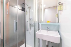 Shower, eco-friendly toiletries, hair dryer, towels