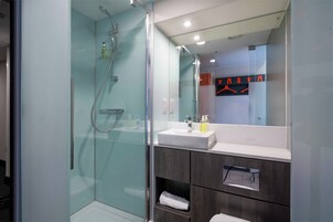 Shower, eco-friendly toiletries, towels, soap