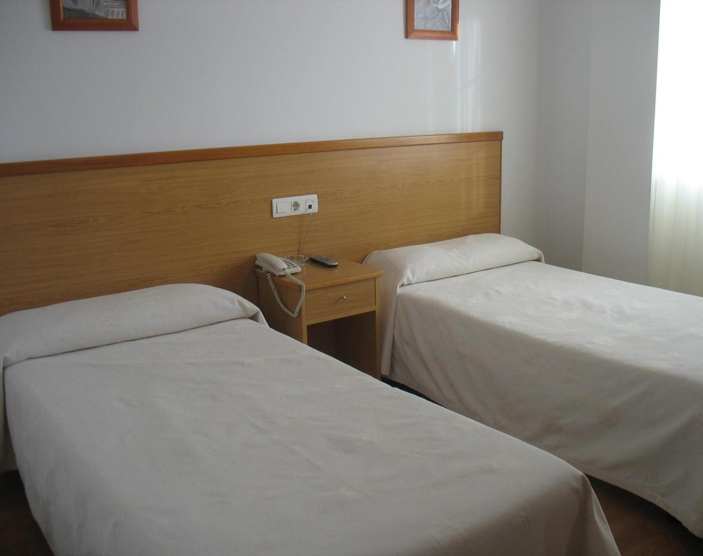 desk, blackout curtains, rollaway beds, free wifi