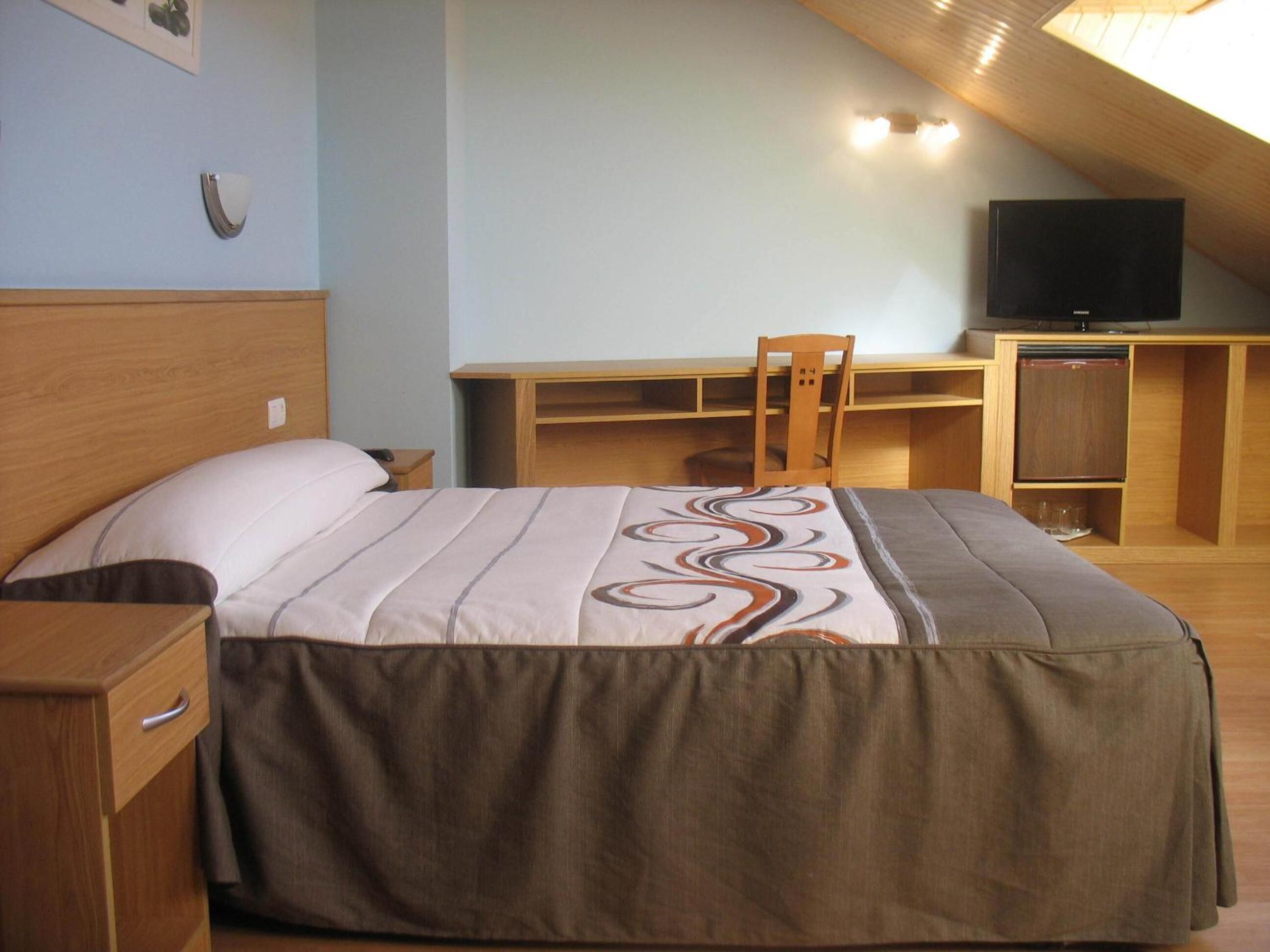 desk, blackout curtains, rollaway beds, free wifi