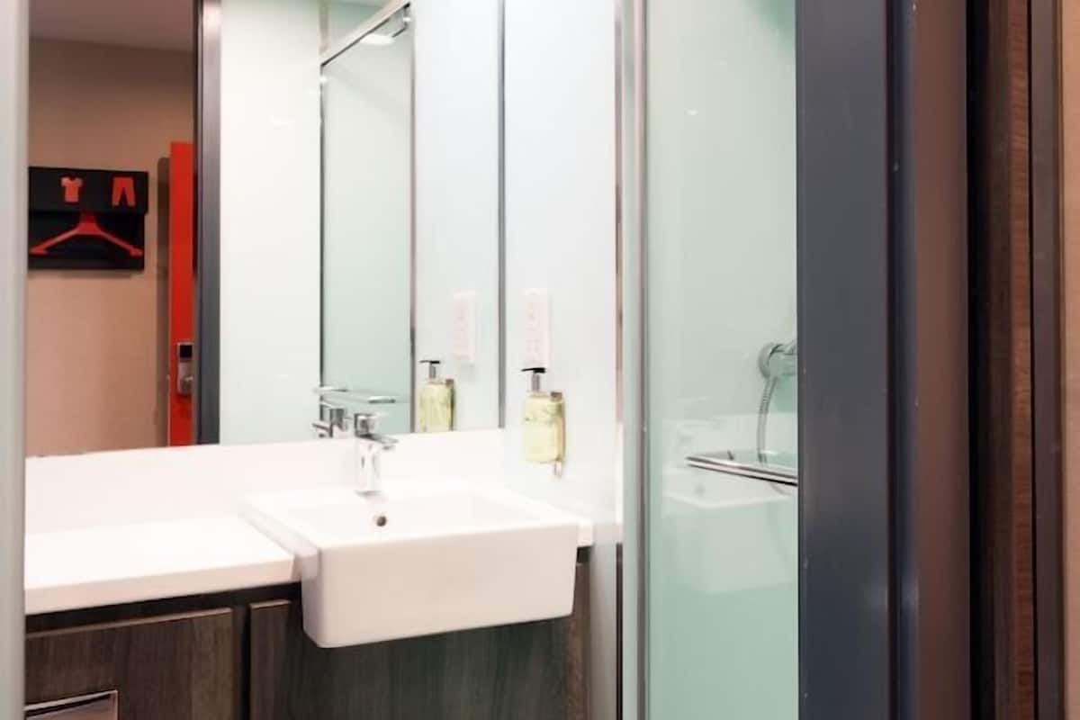 Shower, eco-friendly toiletries, towels, soap