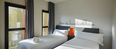 Rideaux occultants, fer et planche à repasser, Wi-Fi, draps fournis