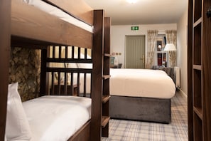 Family Room | 1 bedroom, in-room safe, free WiFi, bed sheets