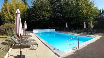 Seasonal outdoor pool, open 9 AM to 9 PM, pool umbrellas, sun loungers