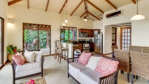 Design Condo, 2 Bedrooms, Non Smoking | Living area | Flat-screen TV