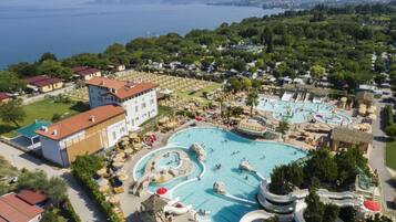Seasonal outdoor pool, pool umbrellas, pool loungers
