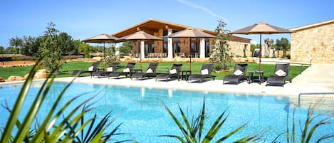 Outdoor pool, pool umbrellas, pool loungers