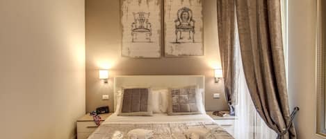 1 kamar tidur, seprai premium, minibar, dan brankas