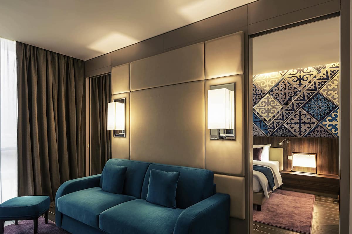 Privilege King Suite with Sofa | Premium bedding, free minibar items, in-room safe, desk