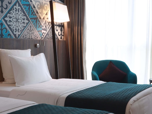Ropa de cama de alta calidad y minibar (con algunos artículos gratuitos)