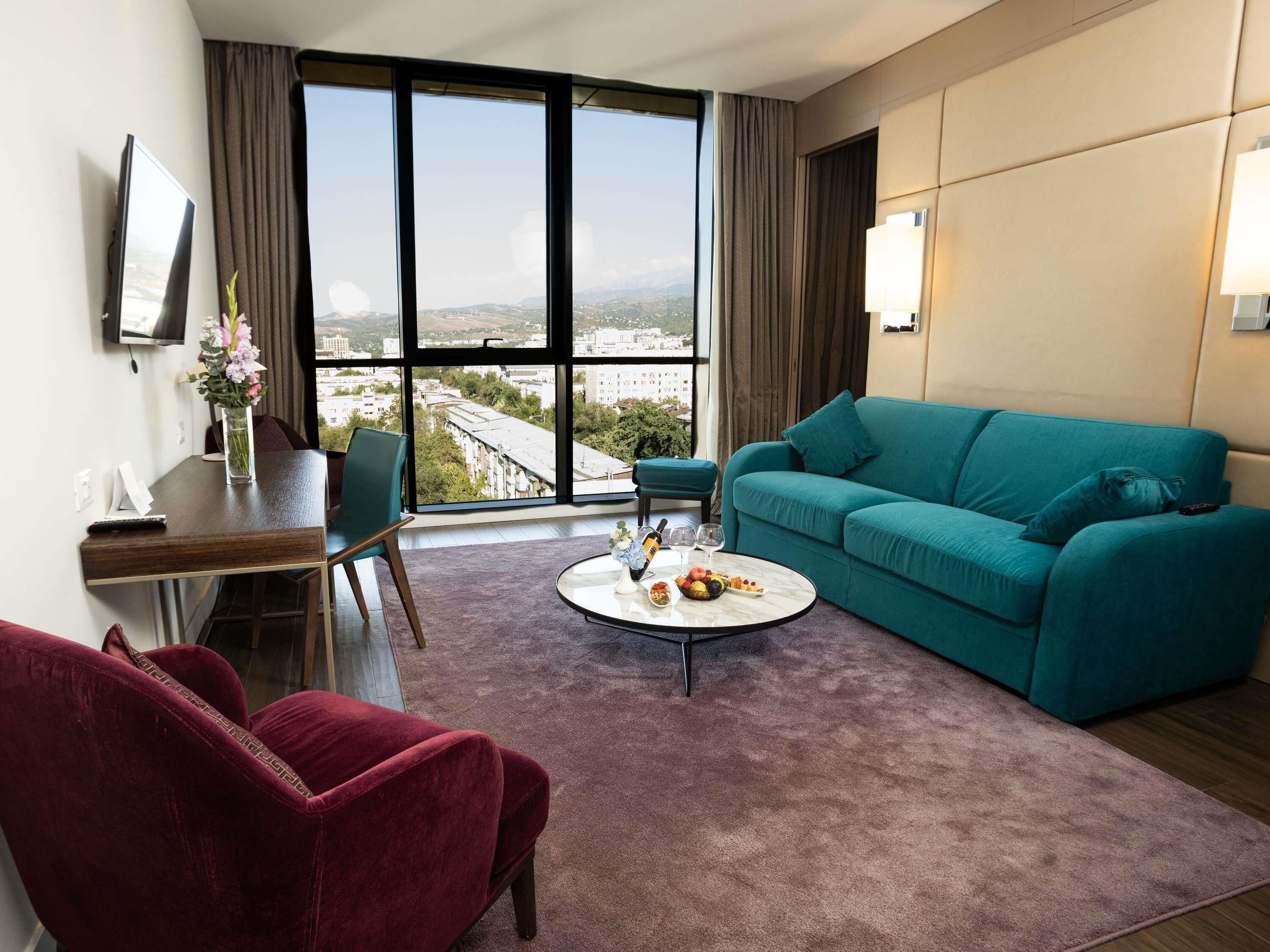Privilege King Suite with Sofa | Premium bedding, free minibar items, in-room safe, desk