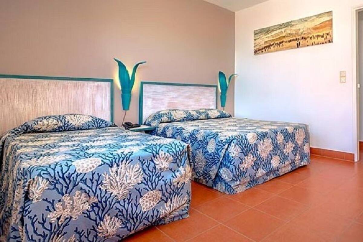Double Room, 1 Double or 2 Twin Beds, Balcony, Sea View | Minibar, in-room safe, desk, blackout drapes