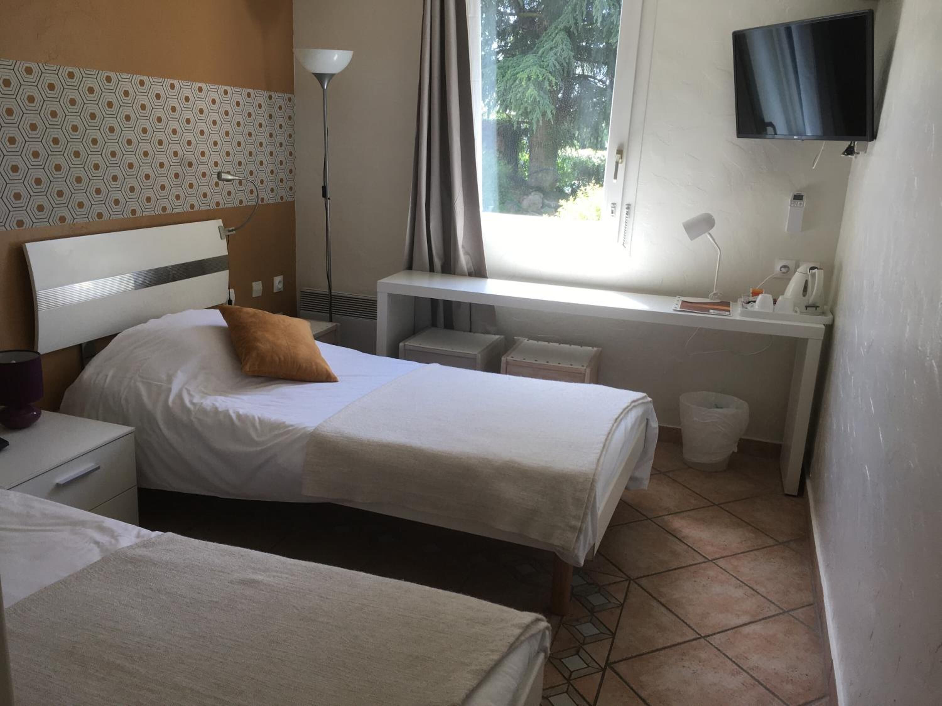 premium bedding, desk, blackout curtains, soundproofing