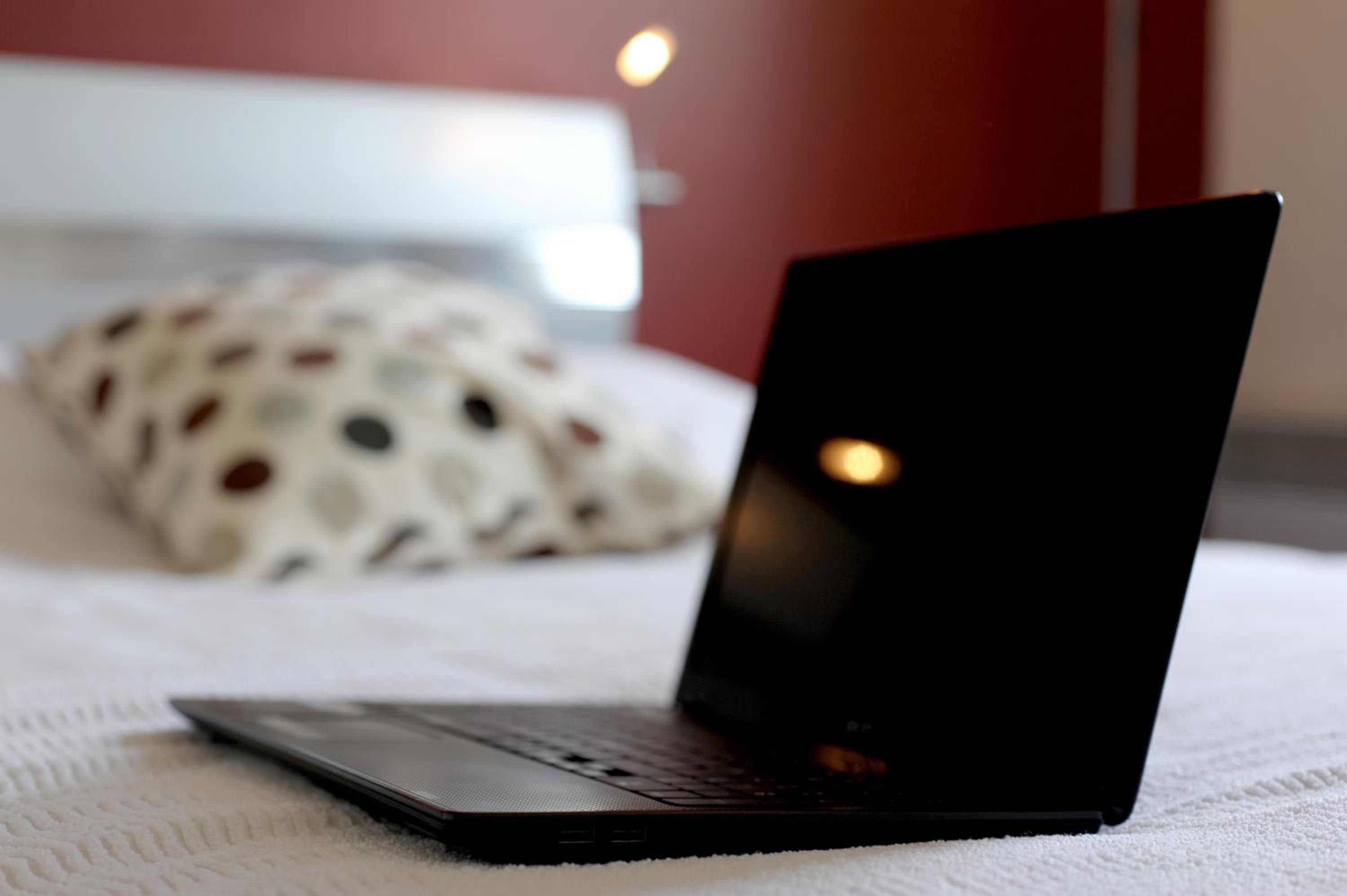 premium bedding, desk, blackout curtains, soundproofing