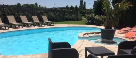 Seasonal outdoor pool, open 9 AM to 9 PM, pool umbrellas, sun loungers