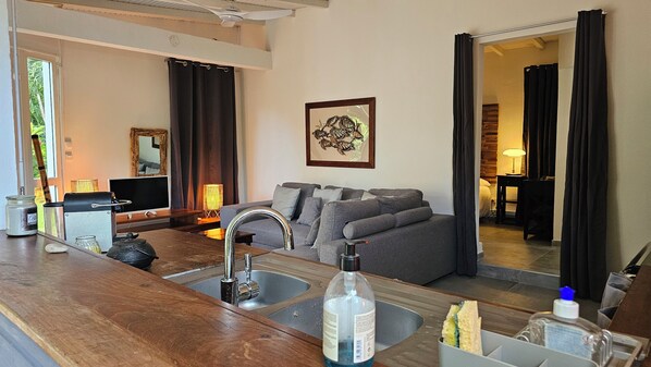 Comfort Bungalow, 1 Double Bed with Sofa bed, Private Bathroom | Living area | Flat-screen TV - Habitation Villa Les Cassias (Petit-Bourg)