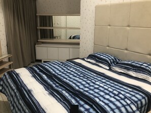 Economy appartement, 2 slaapkamers, uitzicht op de stad | 2 slaapkamers, luxe beddengoed, individueel gedecoreerd