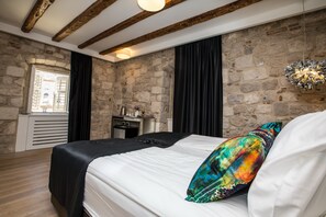 Ropa de cama de alta calidad y minibar