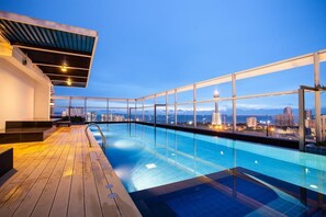 Outdoor pool, pool umbrellas, pool loungers