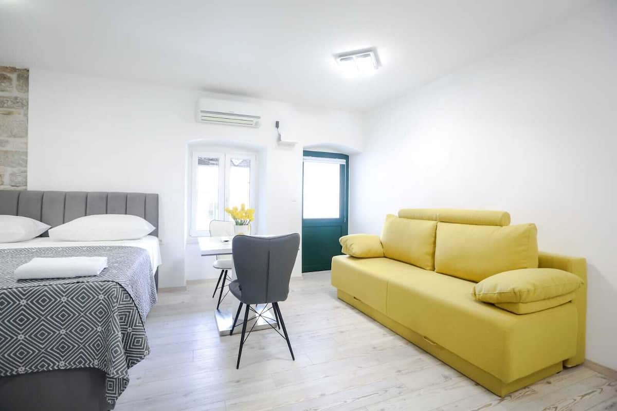 Luxury Room | Living area | Flat-screen TV
