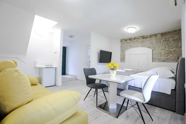 Luxury Room | Living area | Flat-screen TV
