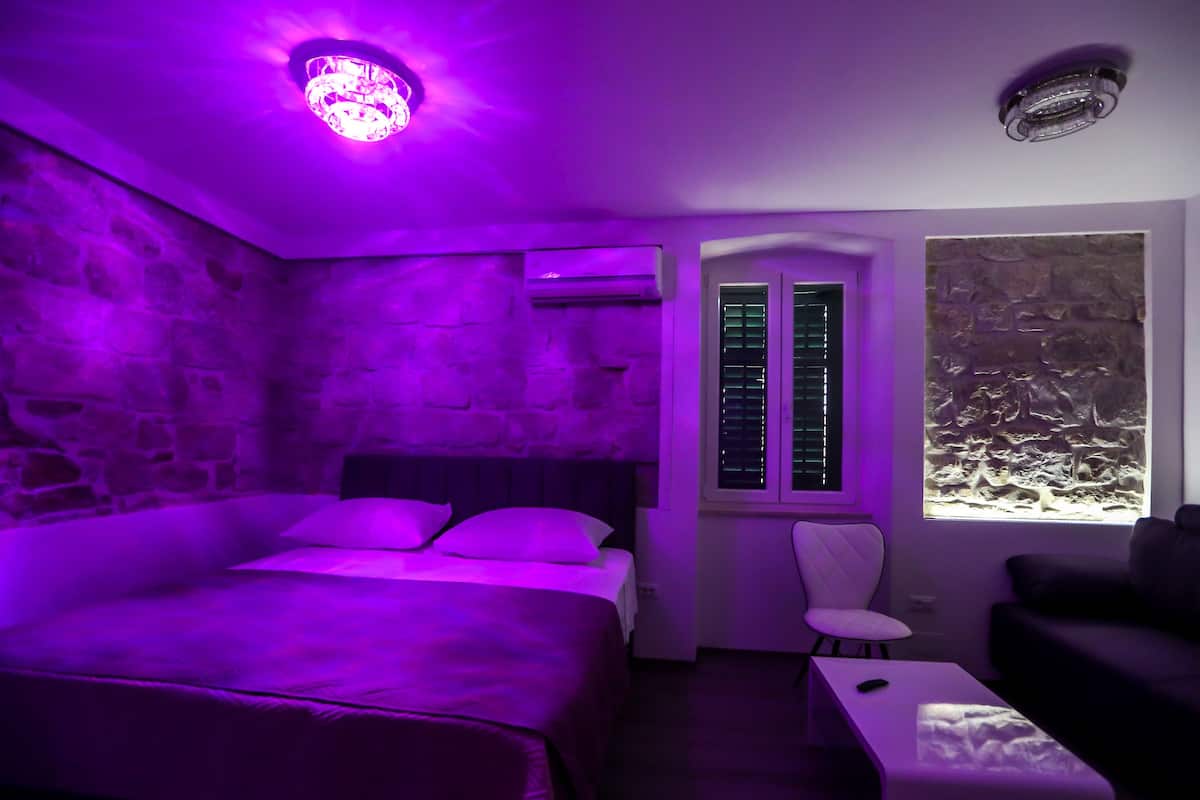 Luxury Double Room, Private Bathroom | Living area | Flat-screen TV