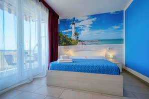 Double Room, Balcony, Partial Lake View | Minibar, in-room safe, individually decorated, desk - The Lighthouse Rooms (Lazise)