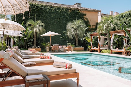 Outdoor pool, open 7:30 AM to 7 PM, pool umbrellas, sun loungers