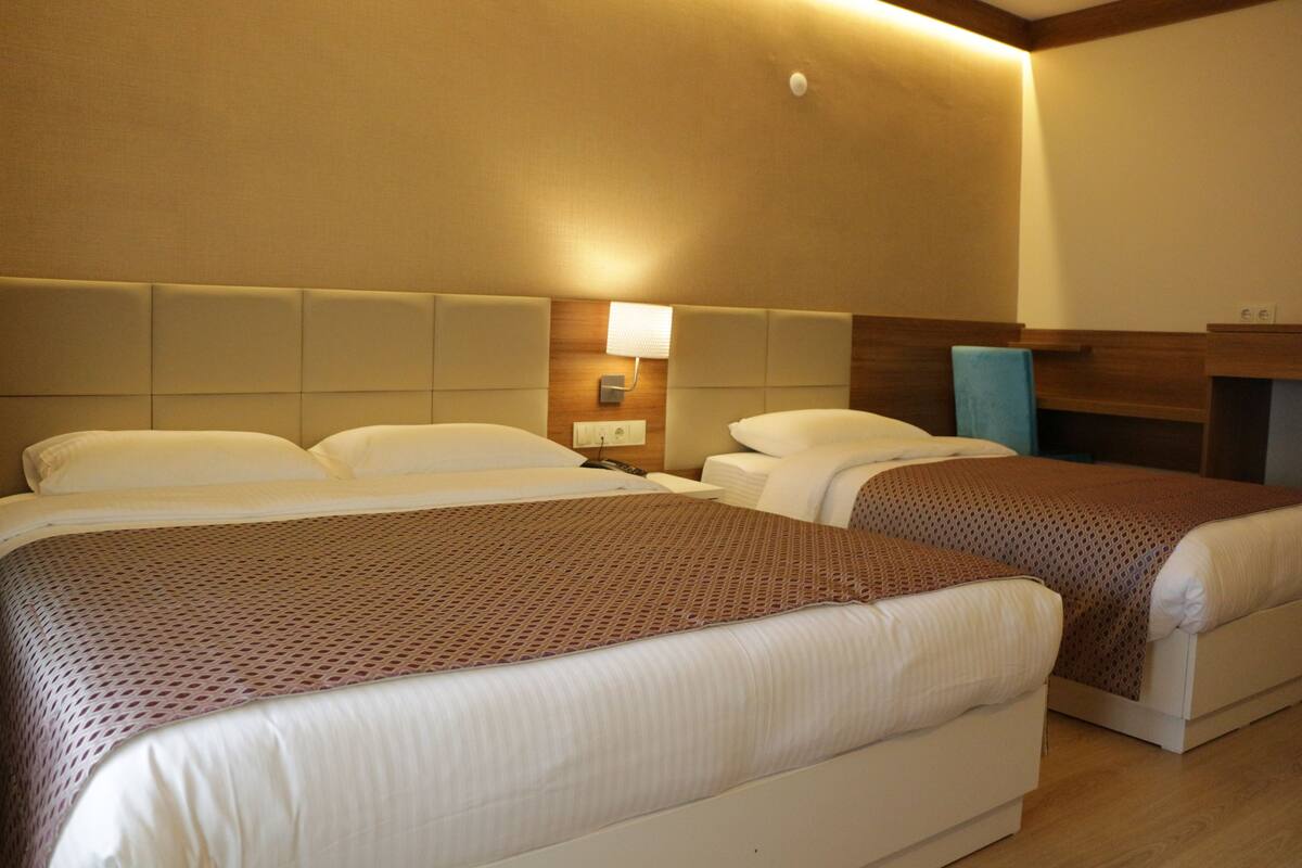 Standard Triple Room | In-room safe, desk, iron/ironing board, free cots/infant beds