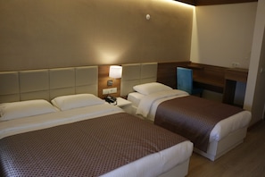 Standard Triple Room | In-room safe, desk, iron/ironing board, free cots/infant beds