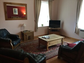 Apartment | Living area | Flat-screen TV, DVD player - Inverness Apartments - Courtyard (Inverness)