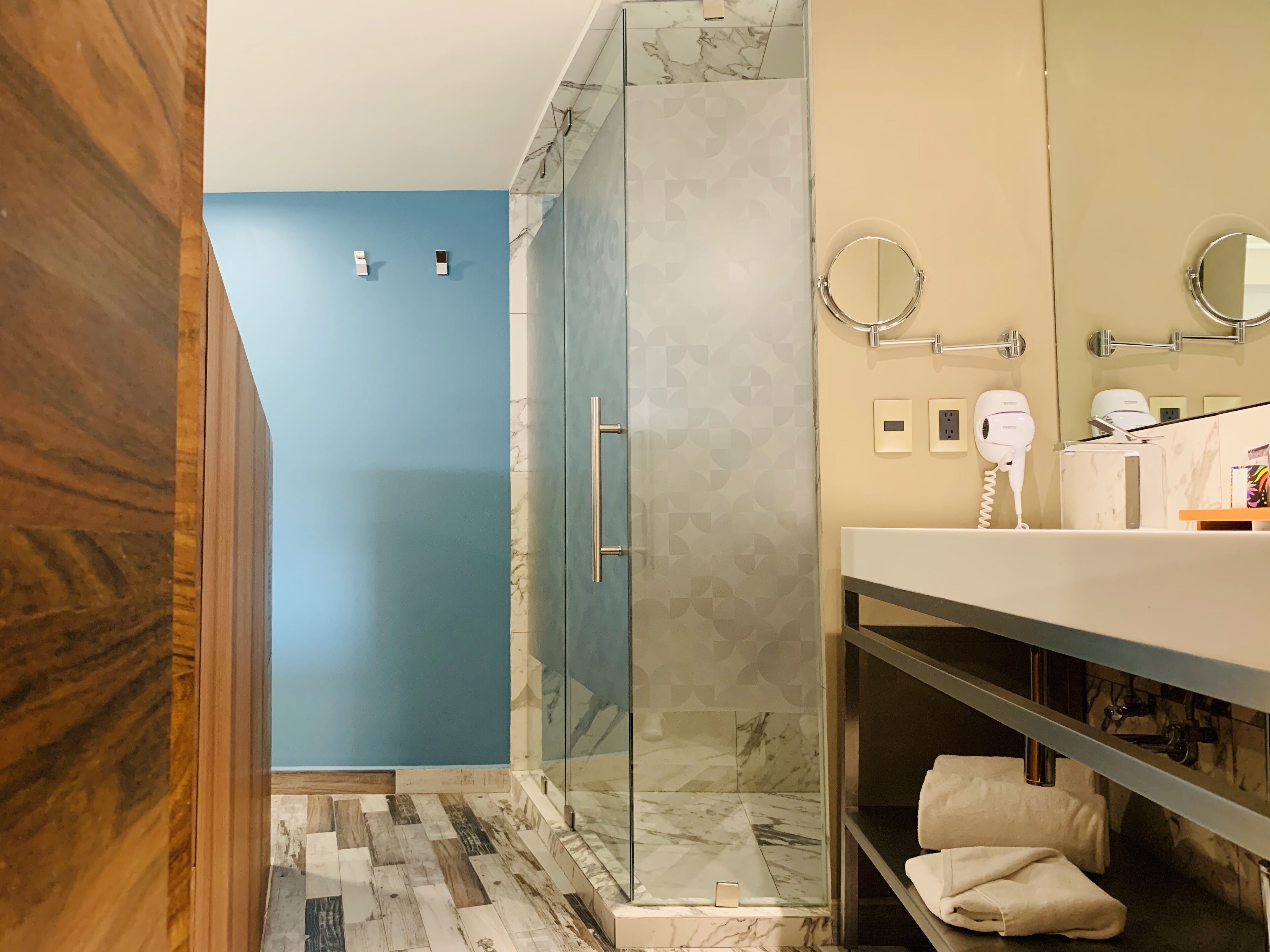 junior suite | bathroom | shower, rainfall showerhead, free toiletries, hair dryer