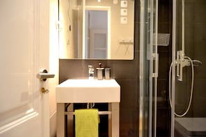 Shower, free toiletries, hair dryer, towels
