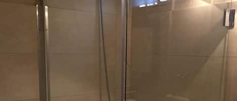 Apartment, 1 Bedroom | Bathroom | Shower, hair dryer, towels, soap