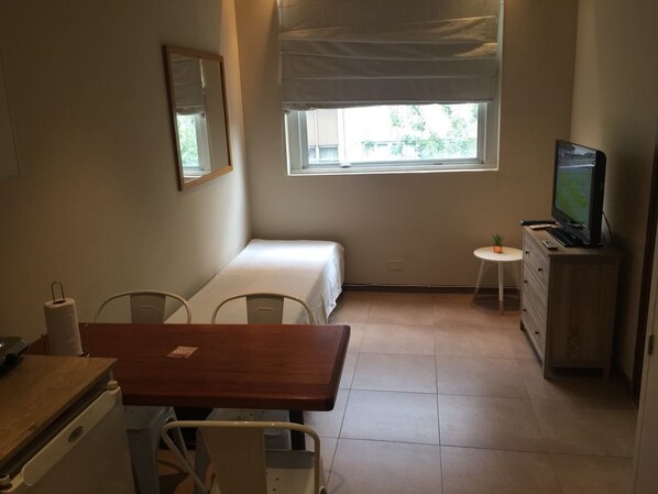 Apartment, 1 Bedroom | Living area | Flat-screen TV - Cozy apt in the heart of Mendoza (Mendoza)