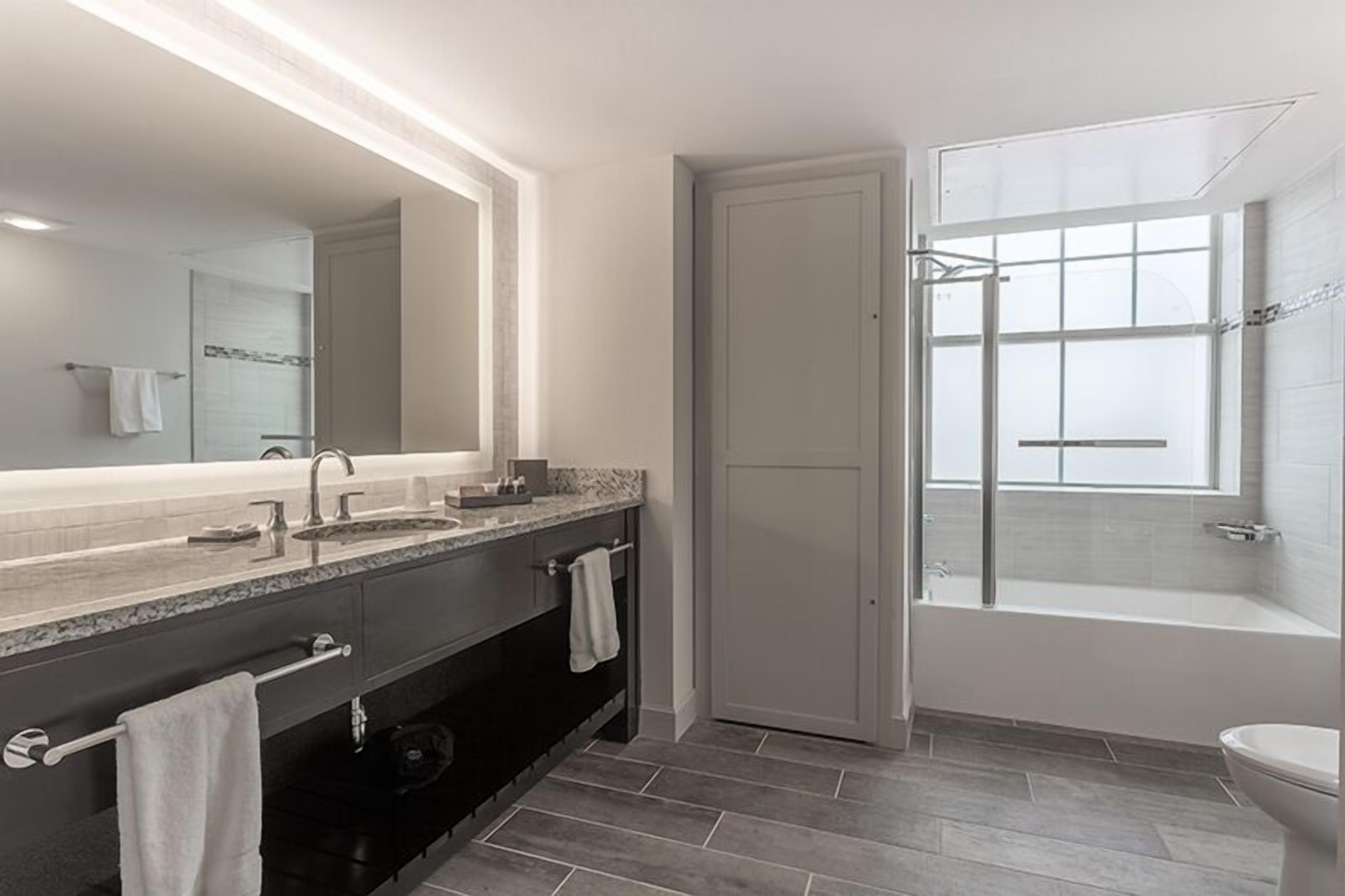 standard suite, 2 queen beds | bathroom | shower, free toiletries, towels