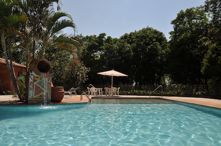 Outdoor pool, pool umbrellas, sun loungers