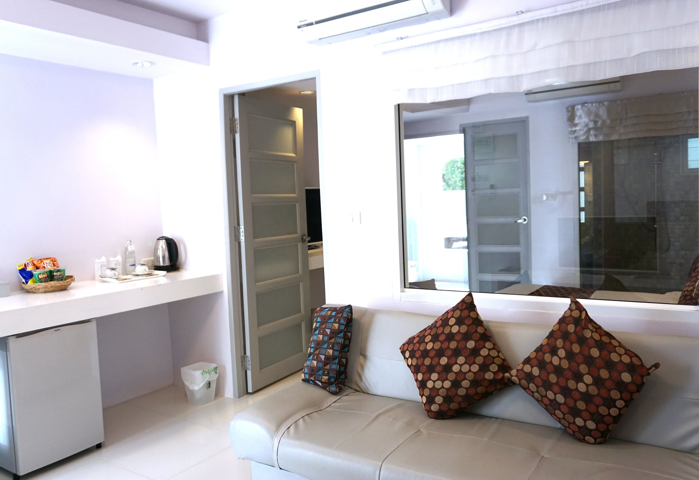 standard double room | living area | flat-screen tv