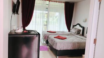 Standard Twin Room | Minibar, blackout curtains, rollaway beds, free WiFi