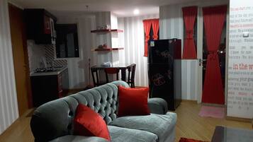 Comfort Apartment (2 Bedrooms) | Living area | 32-inch LCD TV with cable channels, TV