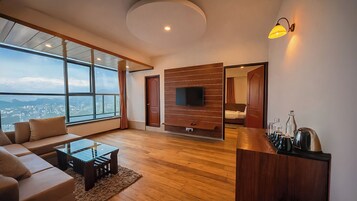 Suite, Mountain View | Living area | Flat-screen TV, fireplace