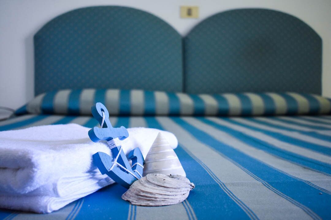 basic triple room | in-room safe, desk, bed sheets