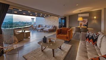 Deluxe Apartment, 2 Bedrooms, Terrace, Sea View | Living area | Flat-screen TV